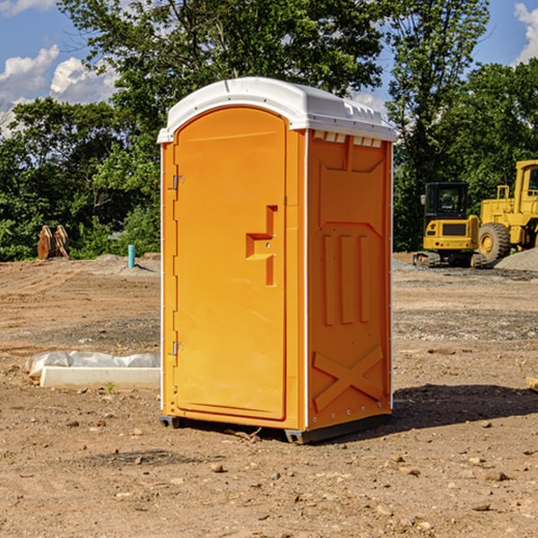 how often are the portable restrooms cleaned and serviced during a rental period in Westby